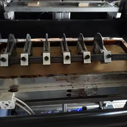 Alt yapıştırma cihazı